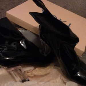 Pat and leather heeled booties with clear heel